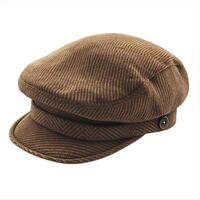 A stylish brown herringbone cap featuring a unique textured pattern and a classic flat design. photo