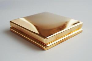 A sleek, reflective gold square box, radiating luxury and elegance, perfect for high-end gifts or decorative purposes. photo