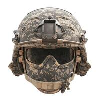 A close-up view of a tactical military helmet with integrated communications equipment and camouflage pattern. photo