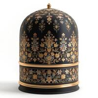 An ornate, black decorative dome featuring intricate floral patterns in gold and vibrant colors. photo
