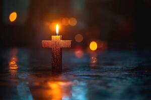 A serene candlelit cross illuminates a peaceful setting, symbolizing hope and faith amidst a backdrop of soft bokeh lights. photo