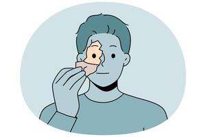 Man tears off fragment of own face to change shell and get rid of psychological problems vector