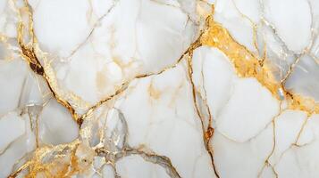 Elegant marble surface with striking golden veining creating an opulent, sophisticated texture and pattern for luxurious designs. photo