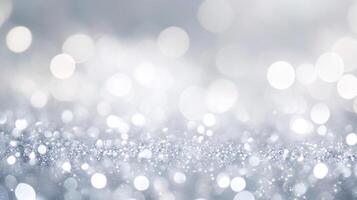 Elegant shimmering background of bokeh lights and silver glitter texture, ideal for festive designs or sophisticated presentations. photo