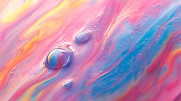 Abstract swirls of pink, blue, and yellow create a dreamy, ethereal scene with water droplets reflecting the colors. Macro. photo