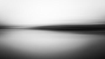 Abstract monochromatic seascape featuring blurred lines of the horizon and water creating a calming and serene effect with simple design. photo