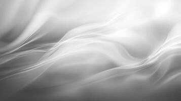 Elegant grey and white abstract waves flow across the frame, creating a dynamic and smooth visual texture for modern designs. photo