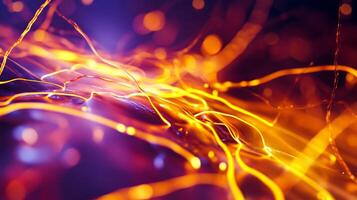 Abstract illumination featuring golden threads and shimmering bokeh against a purple background, perfect for adding warmth to any design. photo