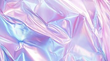 Iridescent material folds and reflects light in an ethereal swirl of pastel colors, creating a visually stunning and otherworldly effect. photo