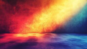 Abstract background with a vibrant color gradient of red, yellow, and blue, creating an eye-catching backdrop with a textured effect. photo