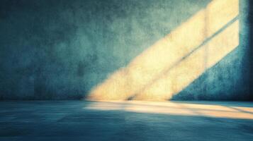 Sunlight streaks across a textured blue wall in an empty room, casting shadows and creating a sense of tranquility and minimalist beauty. photo