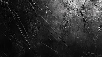 Dark and moody, the image presents a textured surface with prominent linear patterns, creating a dramatic contrast of light and shadow. photo