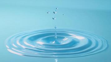 Water droplets falling into a serene surface, creating gentle ripples in a calming blue hue. A scene of tranquility and delicate motion. photo