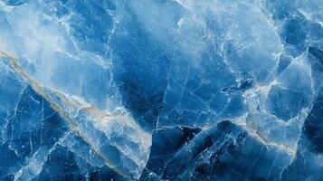 Striking blue stone texture featuring intricate cracks, offering depth and visual interest. Abstract, geological pattern. Elegant stone photo