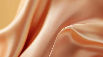 Close-up of flowing, shimmering fabric in a soft peach tone, creating abstract shapes and subtle textures. Elegant and smooth. photo