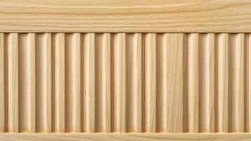 Light colored wood with a repeating textured pattern, showing many evenly spaced vertical grooves between flat, raised ridges. photo