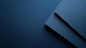 Abstract view of overlapping sheets of blue paper, showcasing texture and minimalist design on a plane surface with sharp edges. photo