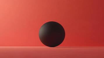 Dramatic studio shot featuring a dark, matte sphere centered on a matching surface against a monochromatic backdrop. Minimalist composition. photo