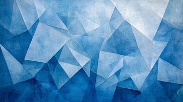 Abstract geometric pattern with triangles in shades of blue creating depth and texture on a textured background. Artistic design. photo