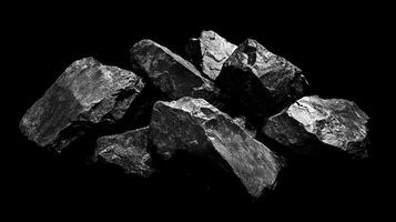 A captivating view of pile of stones, showcasing their textures and shapes in a stark contrast against the black background, creating visual impact. photo