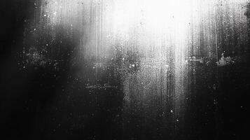 High contrast abstract featuring a gradient from dark to light with textured splashes and streaks, creating a dynamic visual effect. photo