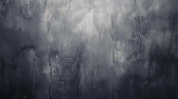 Monochromatic textured surface in shades of gray and black, creating a dramatic and moody abstract. Light reflects unevenly. photo