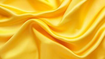 Luxurious waves of golden silk cascade, creating a fluid texture that captures light and shadow in smooth, vibrant folds. photo