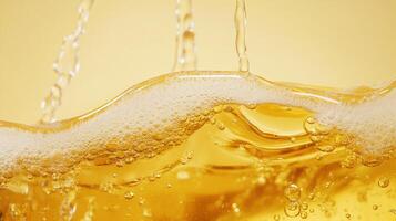 Golden liquid cascading down with effervescence and bubbles, creating a visual texture and inviting the viewer into a world of refreshment. photo