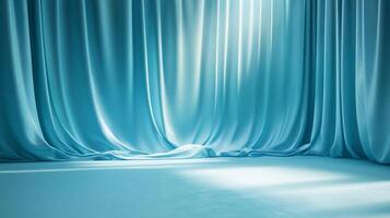 A calming aqua backdrop featuring luxurious draped fabric illuminated by a gentle light, perfect for elegant presentations and serene settings. photo