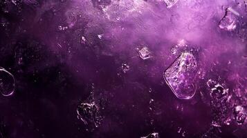 Close-up abstract texture of water droplets and ice crystals on a dark purple surface. Evokes a sense of coldness and beauty. photo