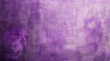 A textured background with shades of purple, fading from dark to light, creating an abstract and visually interesting backdrop or surface. photo