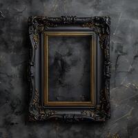 A brown wood rectangle picture frame hangs on a dark wall photo