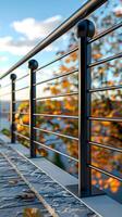 Modern Metal Railing with Autumn Leaves in Background photo