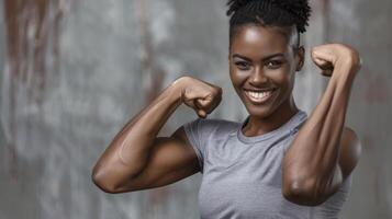 A woman flexing her muscles photo