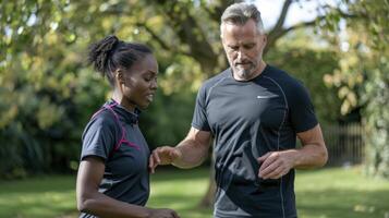 A man and woman are talking while running photo