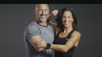 A man and woman posing for a photo with the text, the best way to get fit