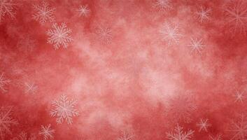 A festive red background with white snowflakes, ideal for holiday designs. photo
