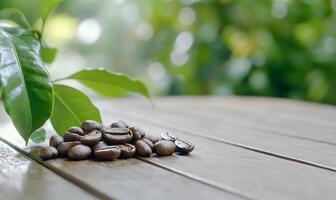 A close-up of coffee beans and leaves on a wooden surface. photo
