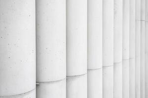 A grayscale abstract architecture shot featuring sharp geometric patterns, strong contrast, and minimalistic depth creates a visually striking composition. photo