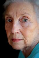 Muted portrait of an elderly person, deep storytelling expression, soft cinematic light, desaturated hues photo
