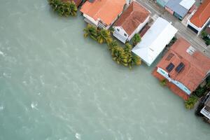 An aerial view of houses in a flooded area photo