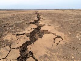 Massive cracks forming in the ground due to intense seismic activity photo
