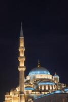 Ramadan or islamic concept. Eminonu Yeni Cami or New Mosque vertical photo