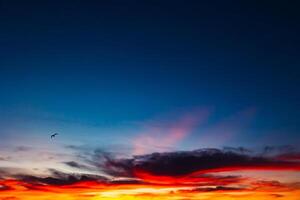 Sunset view. Partly cloudy sky at sunset photo