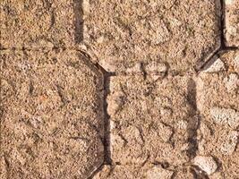 A close up of a brick wall with a square pattern video