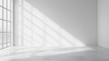 Bright, empty room with light streaming through large windows creating interesting shadows on the walls and floor. Clean and modern space. photo