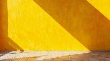 Sunlight casts shadows on a bright yellow wall, creating a striking contrast and highlighting the textured surface. Geometric shapes and vibrant color. photo