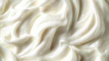 Luminous swirls of white create a calming and soft texture, evoking a sense of smoothness and gentle movement in creamy abstract art. photo