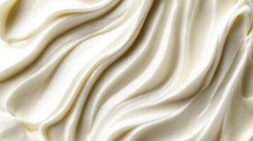 Abstract view of white cream filling with elegant swirl pattern, ideal for a culinary texture or surface for cosmetic application. photo