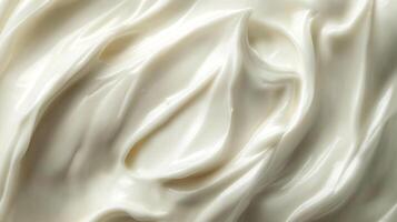 A creamy, smooth texture with delicate swirls and a glossy finish. An abstract, organic design evokes comfort and luxury. photo